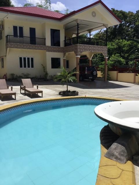 VALENCIA HOUSE AND LOT FOR SALE